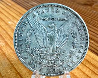 This lot features a 1891-S Morgan Dollar.