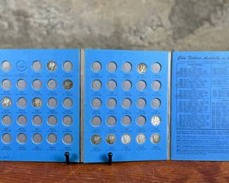 Mercury Head Dime collection spanning 1916 to 1945 housed in a blue Whitman Hobby album. Various coins from the series are included, with a total of thirty (30) in the album.