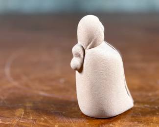 This lot features an original sculpture by listed artist, Maxine Toya and measures, 2.75” H.