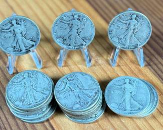 This lot features nineteen (19) 90% silver Walking Liberty half dollars.