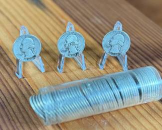 This lot features fifty-two (52) 90% silver quarters with a $13.00 face value.