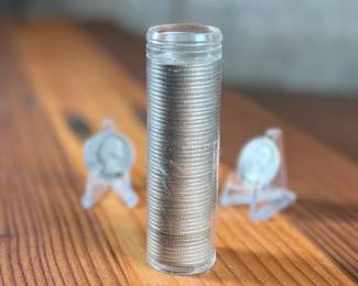 This lot features fifty-two (52) 90% silver quarters with a $13.00 face value.