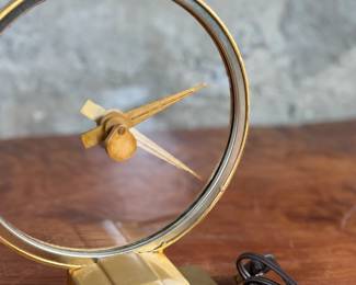 Jefferson ‘Golden Hour’ electric clock, manufactured by Jefferson Electric Company, Bellwood, Illinois. Features a brass-tone finish and an open-circle design with a 9” height. Operates using 110-120V AC, 2-5 watts. Includes plug-in cord. Tested and in working condition.