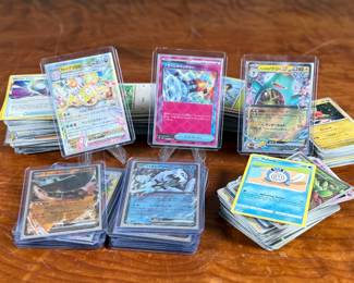 This lot features a large collection of Pokemon cards including both English & Japanese. Many holos and a good amount sleeved for protection.