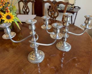 $150 - Sterling weighted candlesticks 