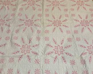Antique pink crosstitch quilt