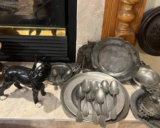 Pewter spoons and plates