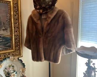 Mink Jacket , pheasant feather hat , iron hall tree rack