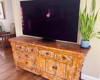 Gorgeous Arhaus Asian inspired console with 4K smart TV