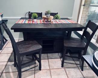 Tall Dining table with 4 chairs and storage below the table