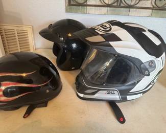 Background Small blk. helmet  , 1/2 helmet xl and NEW Aria size Large Brand new