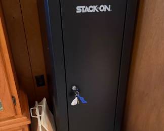 Gun cabinet with keys