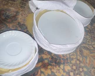 Pile of like new China in bags