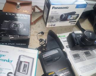 Polaroids, Coolpix is SOLD, Panasonic Movie camera, Cannon digital, Walkman, oh my
