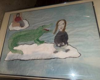Girl getting eaten by a crocodile ?