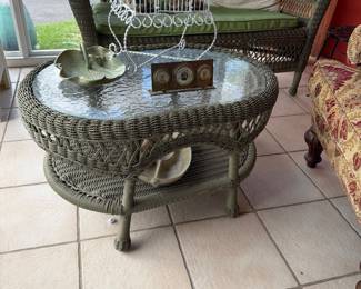 Wicker loveseat, two chairs and table