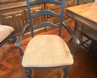 Up close of Chairs with 5 Legged Table.  There Are 2 Captain Chairs & 4 Regular Chairs