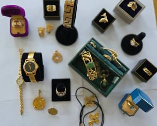 Santorini Gold Jewelry, Atocha shipwreck gold coin pendant, Gold dolphin bracelet and rings; Gold Greek Key link bracelet included.