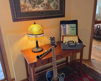 Student Accordion, Dean Guitar, Clarinet, Mission Style Desk with slide-out keyboard shelf.