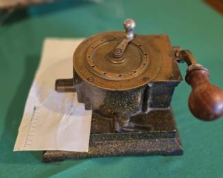 1899 perforated check canceling machine