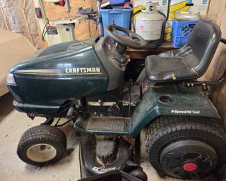 Riding mower with plow