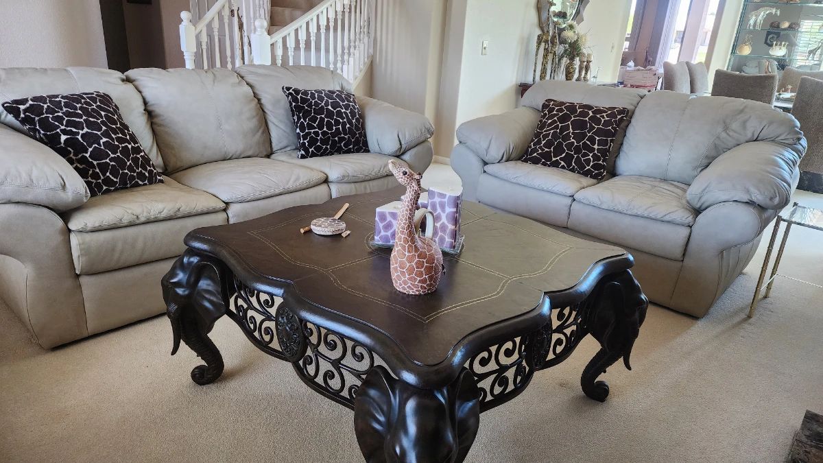 Beautiful leather sofa and two loveseats. 
