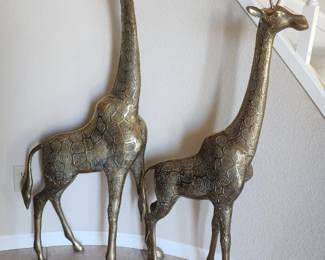 Gorgeous brass giraffes approximately 4 ft tall