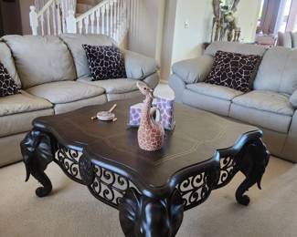 Beautiful leather sofa and two loveseats. 