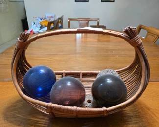 Decorative Glass Spheres and Woven Wicker Basket