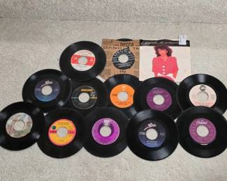 Twelve 45 RPM Records Featuring Various Artists