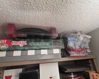 A Group of Boxed Holiday Decor and Electronics