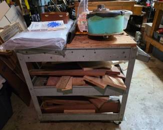 An Industrial Three-Tier Rolling Utility Cart