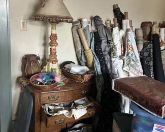 Lamp and bolts of fabric