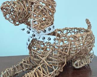 Woven Rattan Dog Figurine with Paw Print Ribbon
