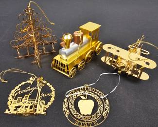 Lot #113 - Vintage Gold Metal Washington State, Train, Plane and Christmas Tree Ornaments Set