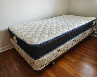 Lot #143 - Mattress Firm Denver Twin Size Sleepy's Basic Model 7036 Mattress (2022) Plus Floral Box Spring & Metal/Wood Base