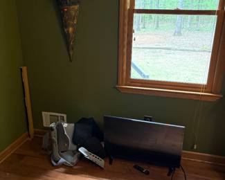 Back brace, “boot” for broken foot and a TV.  Picture kind of dark so wanted to list what was in this picture.  