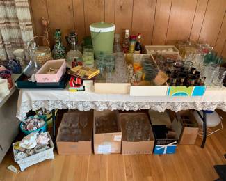 Bar ware; glassware. Also not buckets of sea shells under table