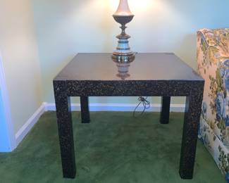 gold and black speckled end table; heavy lamp
