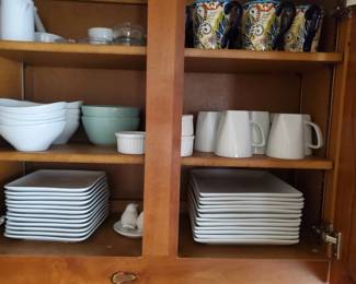 Crate and Barrel dishes and similar throughout kitchen 