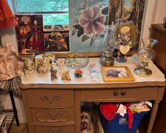 Desk, pantings, kids clothes.  New clothes, socks 