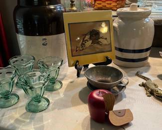 Crocks and a wooden apple