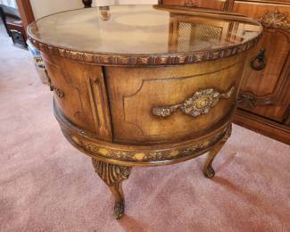 oval end table with storage