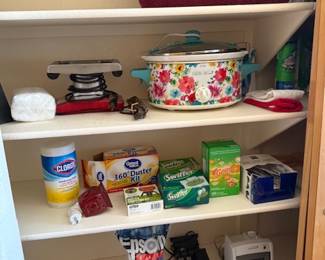 Towels, crock pot, cleaning supplies