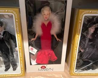Effanbee Groucho Marx, vintage 1983 World Doll Marilyn Monroe, and Effanbee May West dolls.