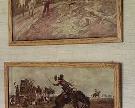 Prints of paintings by Charles Marion Russell, "The Travelers" and "Rider of the Rough String"