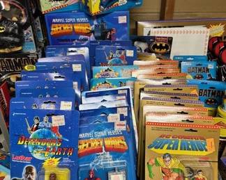 1986 Galoob "Defenders of the Earth" action figures, 1984 Mattel Marvel Super Heroes action figures and 1989 Toy Biz DC Comics Super Heroes Robin action figures.