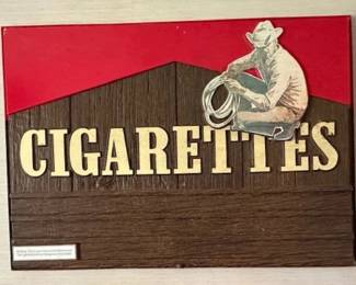 Vintage 1970s "Marlboro Man" cigarette advertising sign.