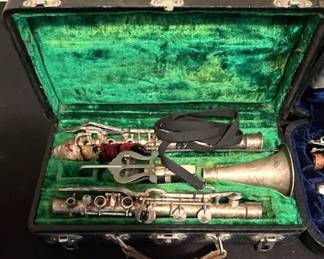 Vintage "The Regent" metal clarinet produced by the Ohio Band Instrument Company.