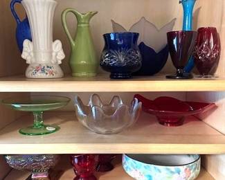 Variety of vintage colored glassware.